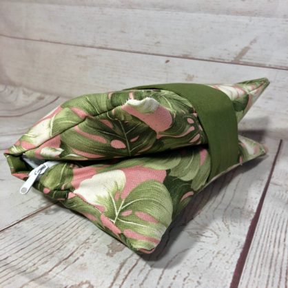 pink and green lead diaper clutch
