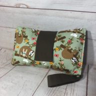 green sloth nappy wallet